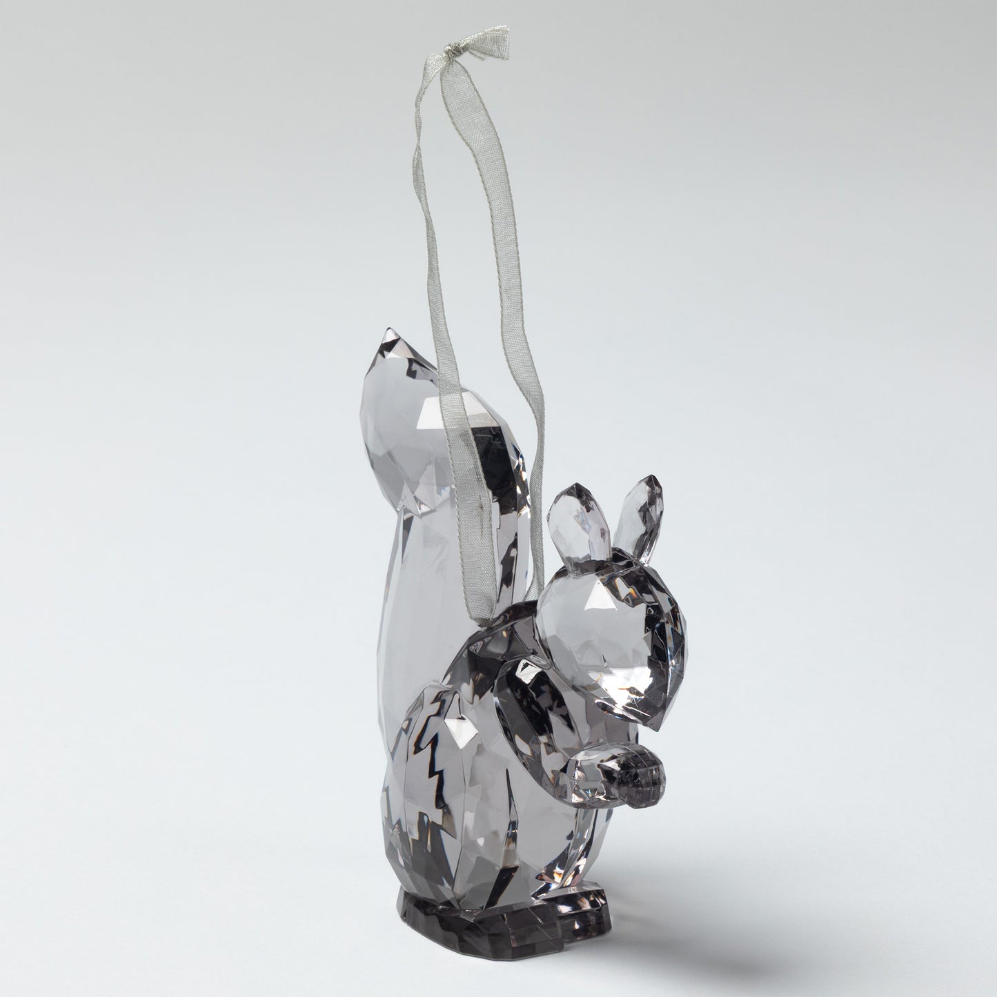 Crystal squirrel figurine on a white background