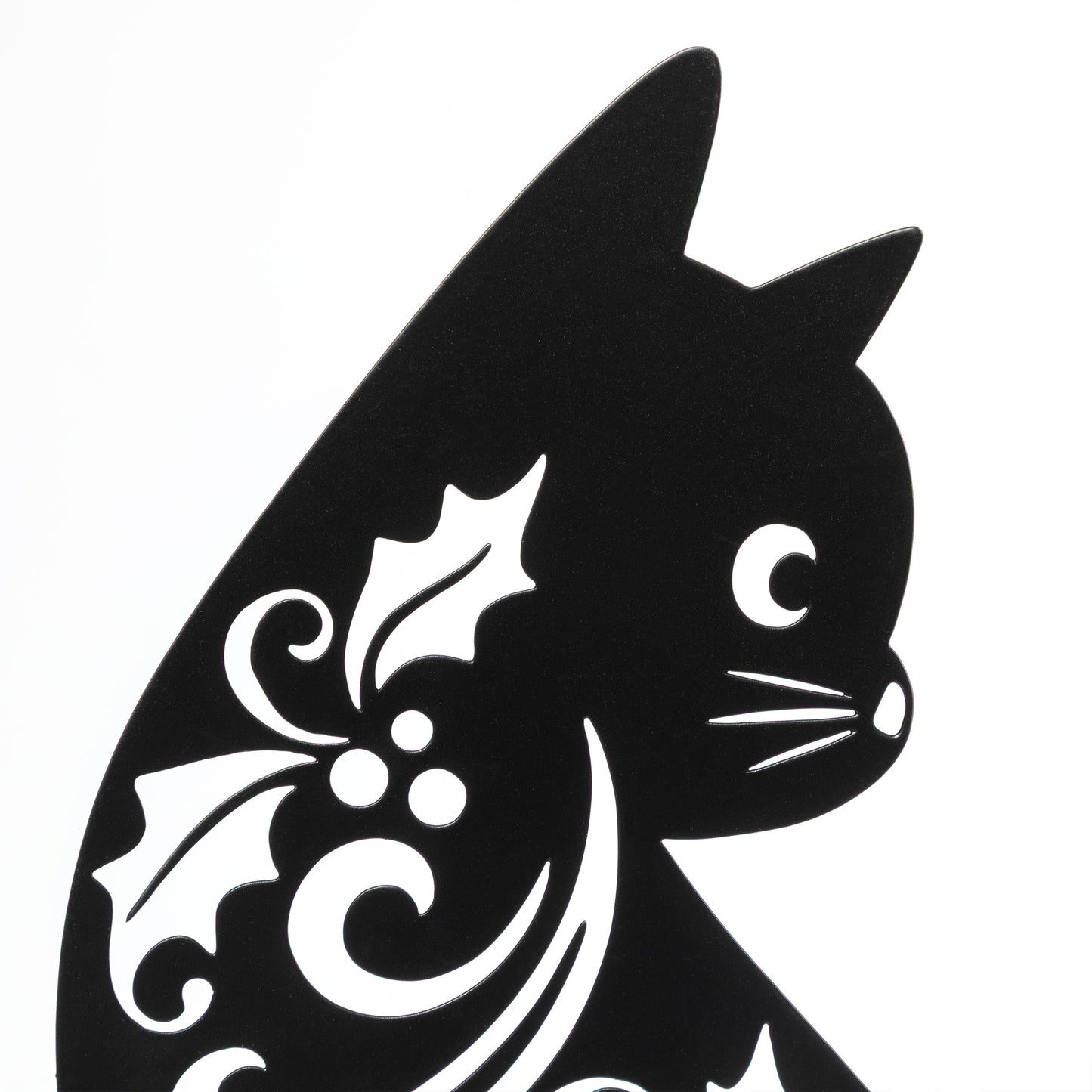 Black silhouette of a cat with decorative patterns on a white background