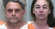 On the left, an older man with gray hair wears an orange jumpsuit; on the right, a middle-aged woman with dark hair also wears an orange jumpsuit.