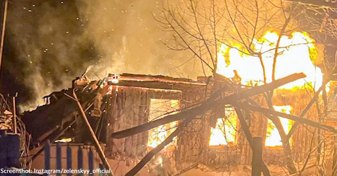 building on fire in the middle of night