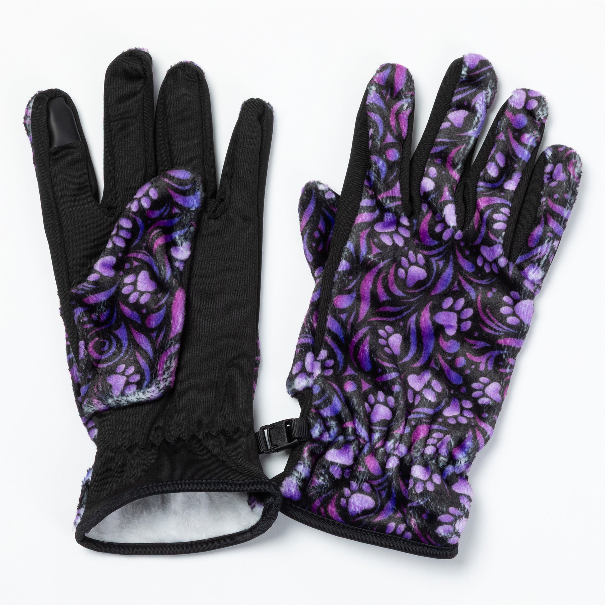 A pair of touchscreen technology fingertips warm black fleece gloves adorned with purple paw prints and swirls clasped together with a small black clip.  