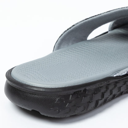 Gray sandal with black sole on a white background