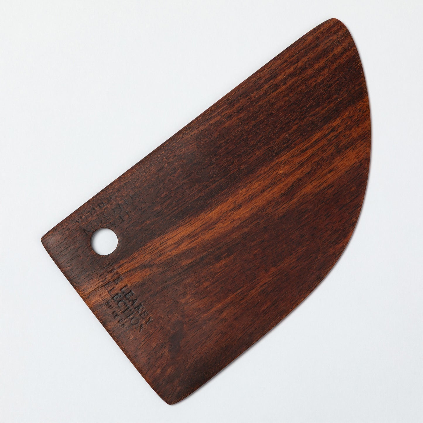 Wooden pastry blade on a white background