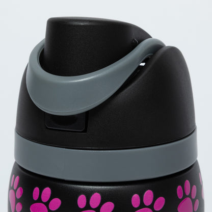Black water bottle with pink paw prints and gray lid on a white background