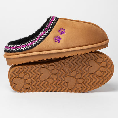 Tan slipper shoes with embroidered paw print design, and paw prints on the outsoles, on a white background