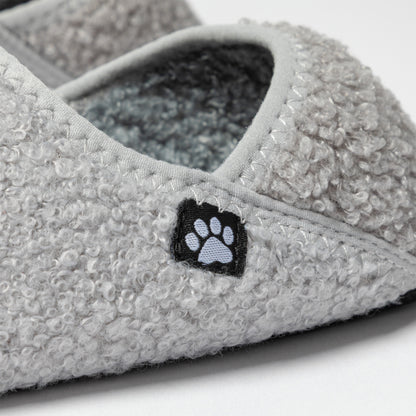 Gray slipper with a paw print design on a white background