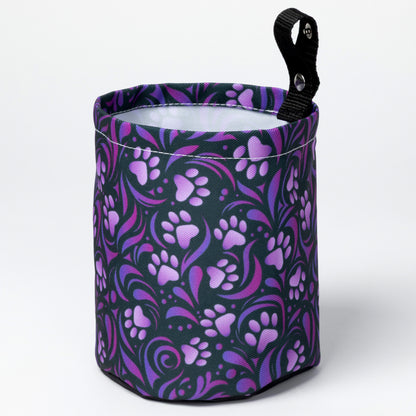 Collapsible car garbage holder with purple paw print pattern on a white background