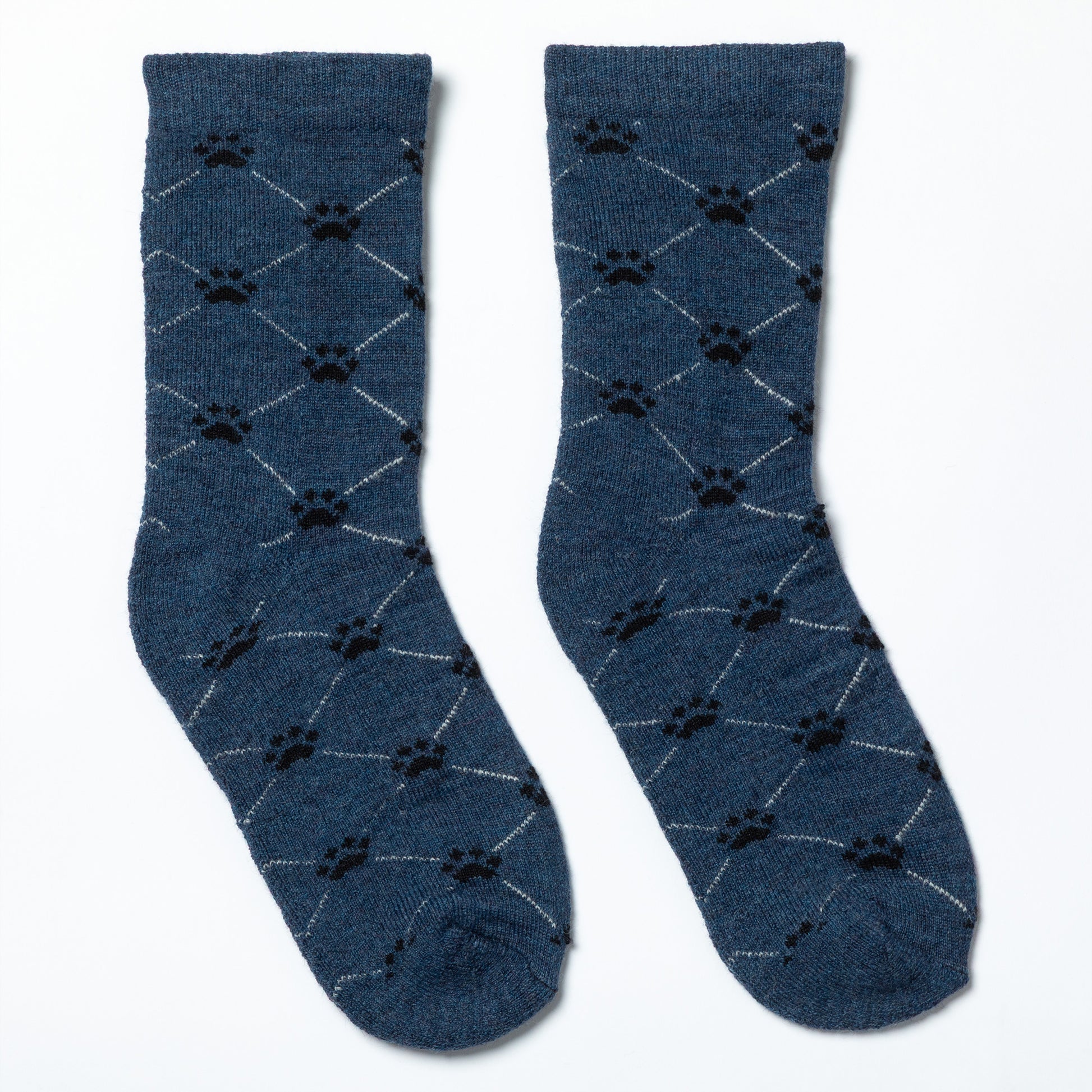 Pair of blue socks with black paw print pattern on a white background