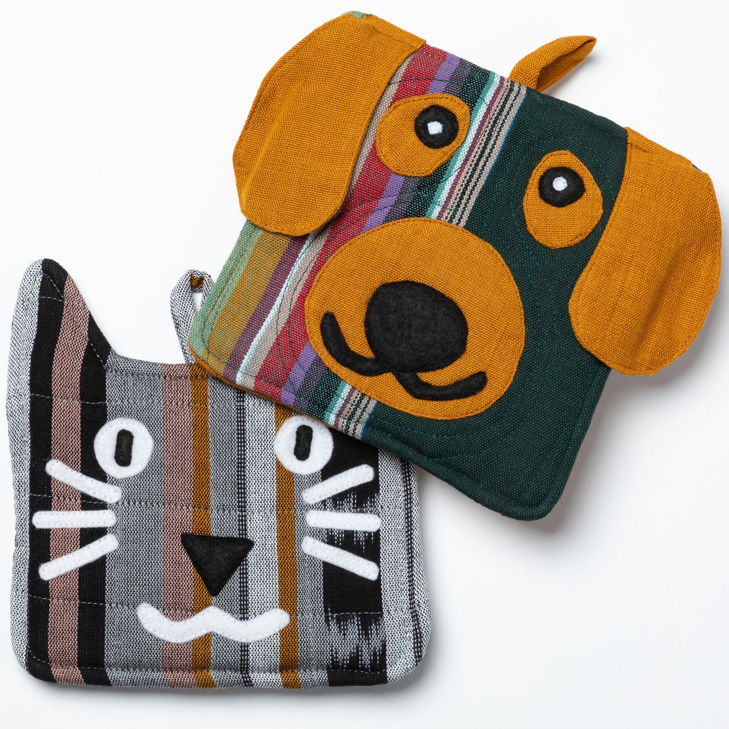 Two fabric pot holders shaped like a dog and a cat on a white background