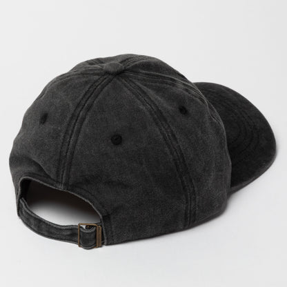 Black baseball cap on a light gray background