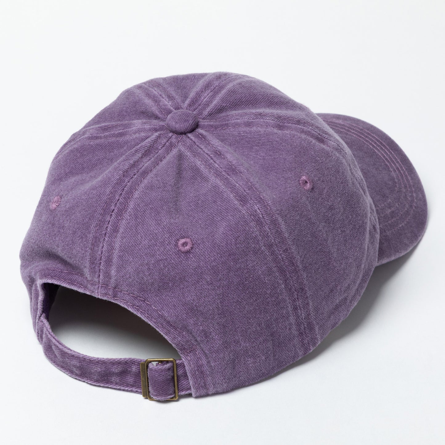 Purple baseball cap on a white background