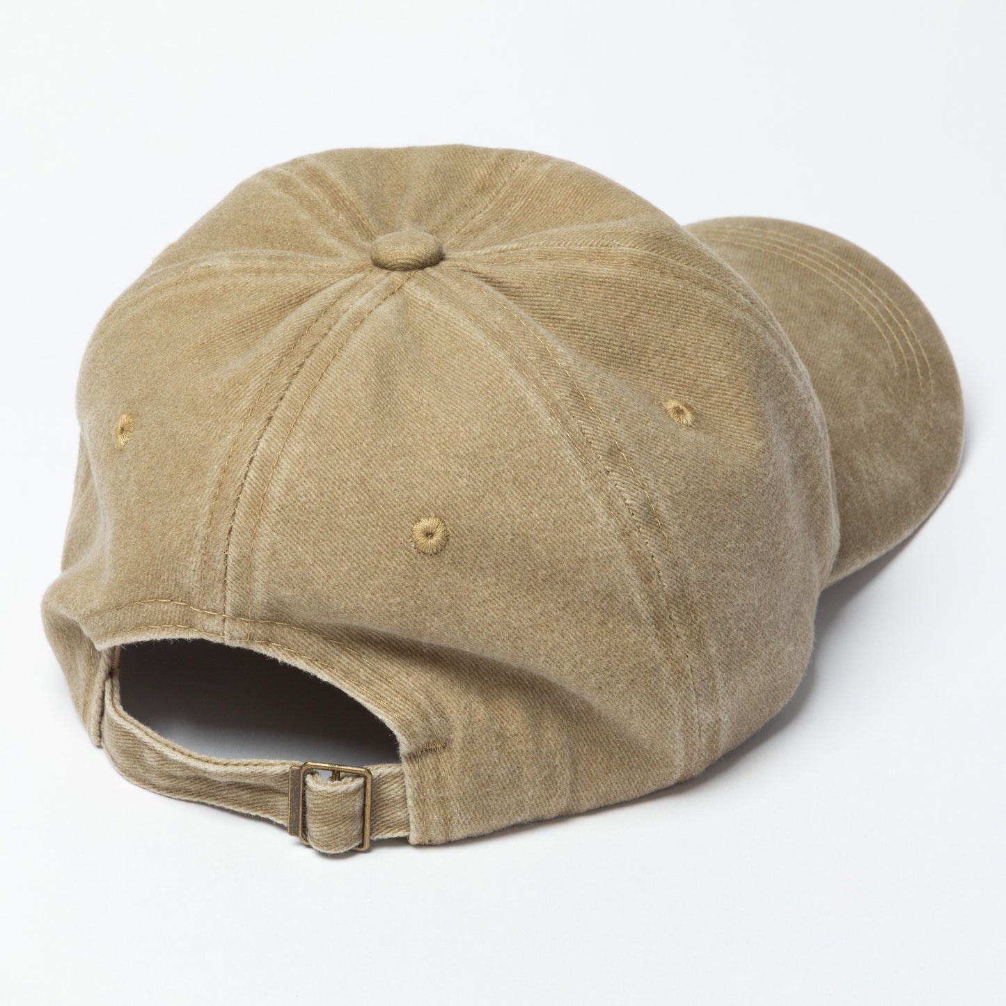 Tan baseball cap on a white background