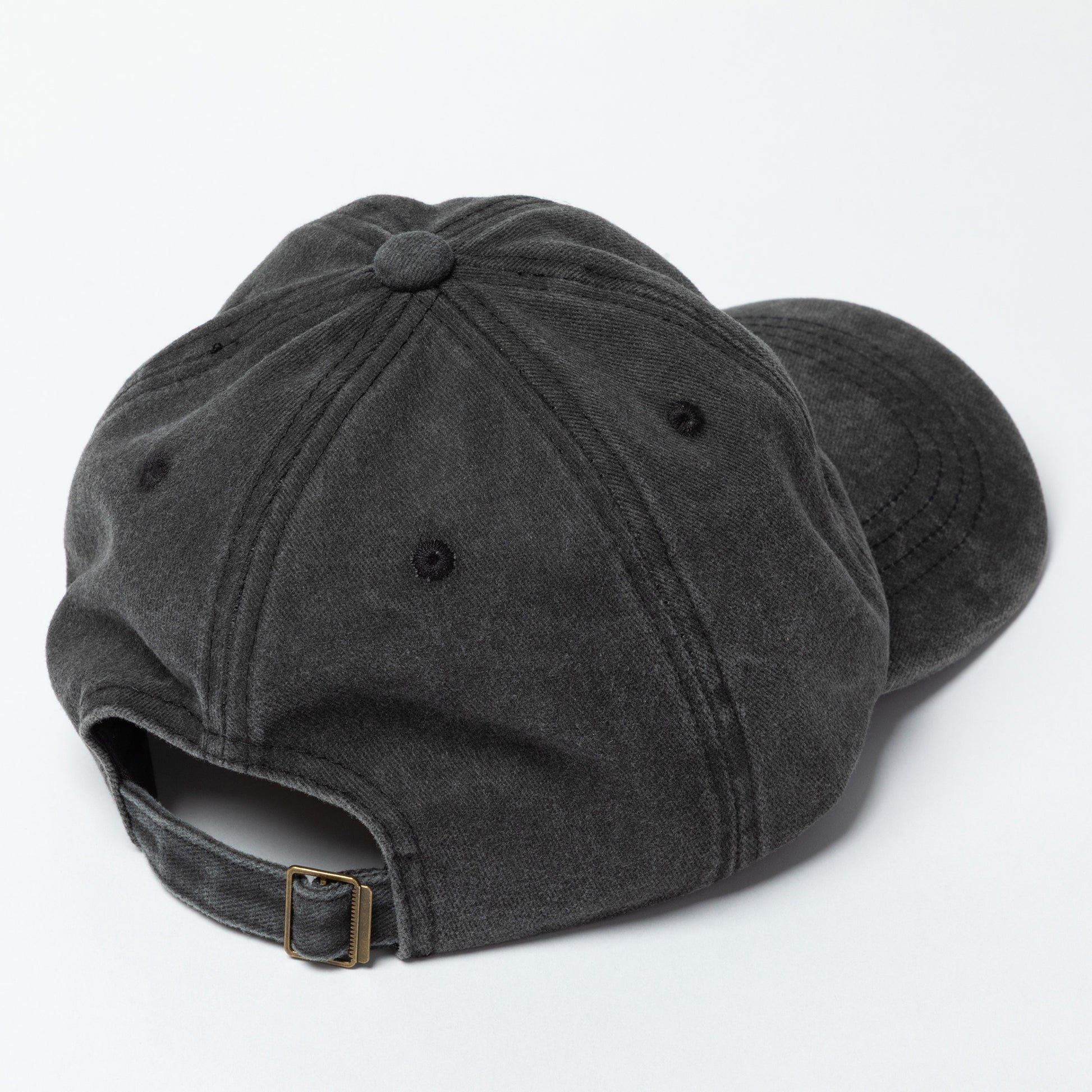 Black baseball cap on a white background