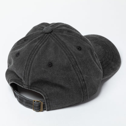 Black baseball cap on a white background