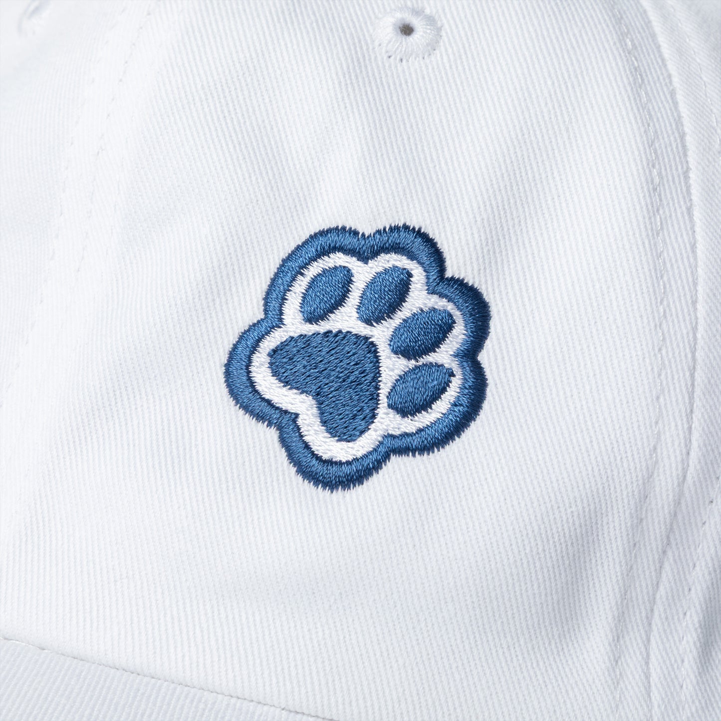 Embroidered paw prints on a white hat