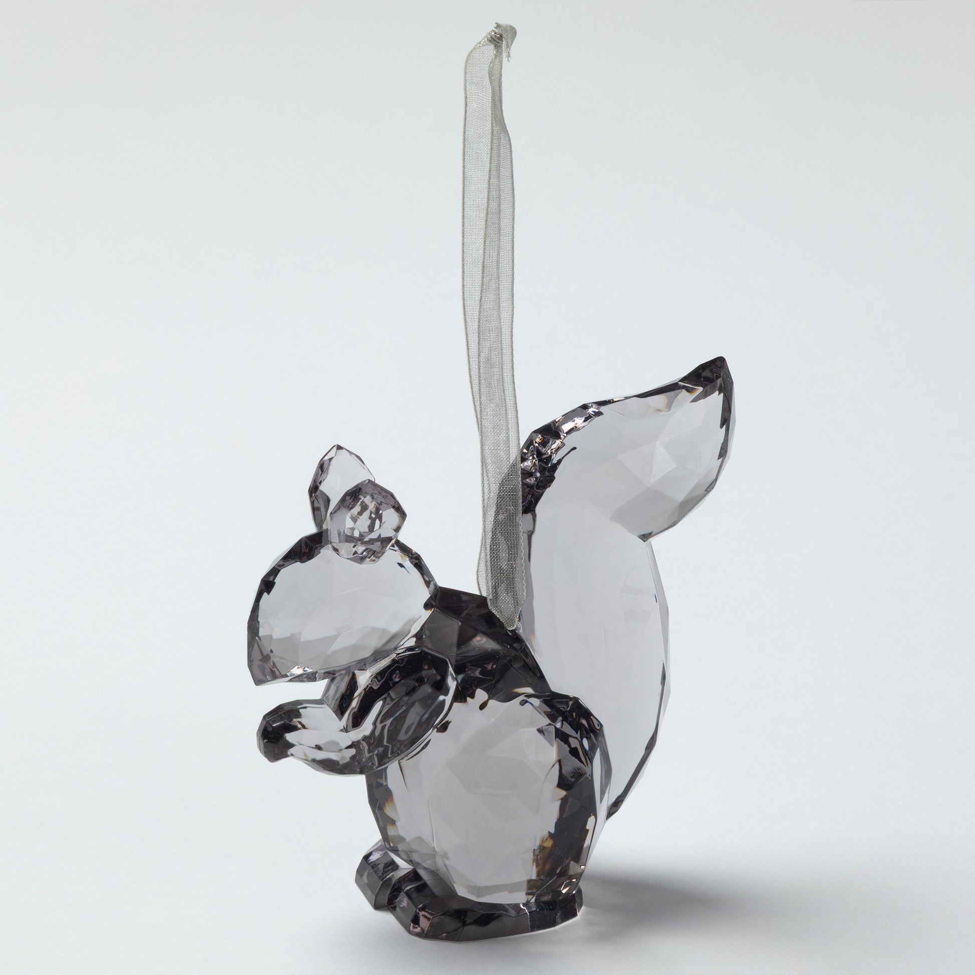 Crystal squirrel figurine on a white background