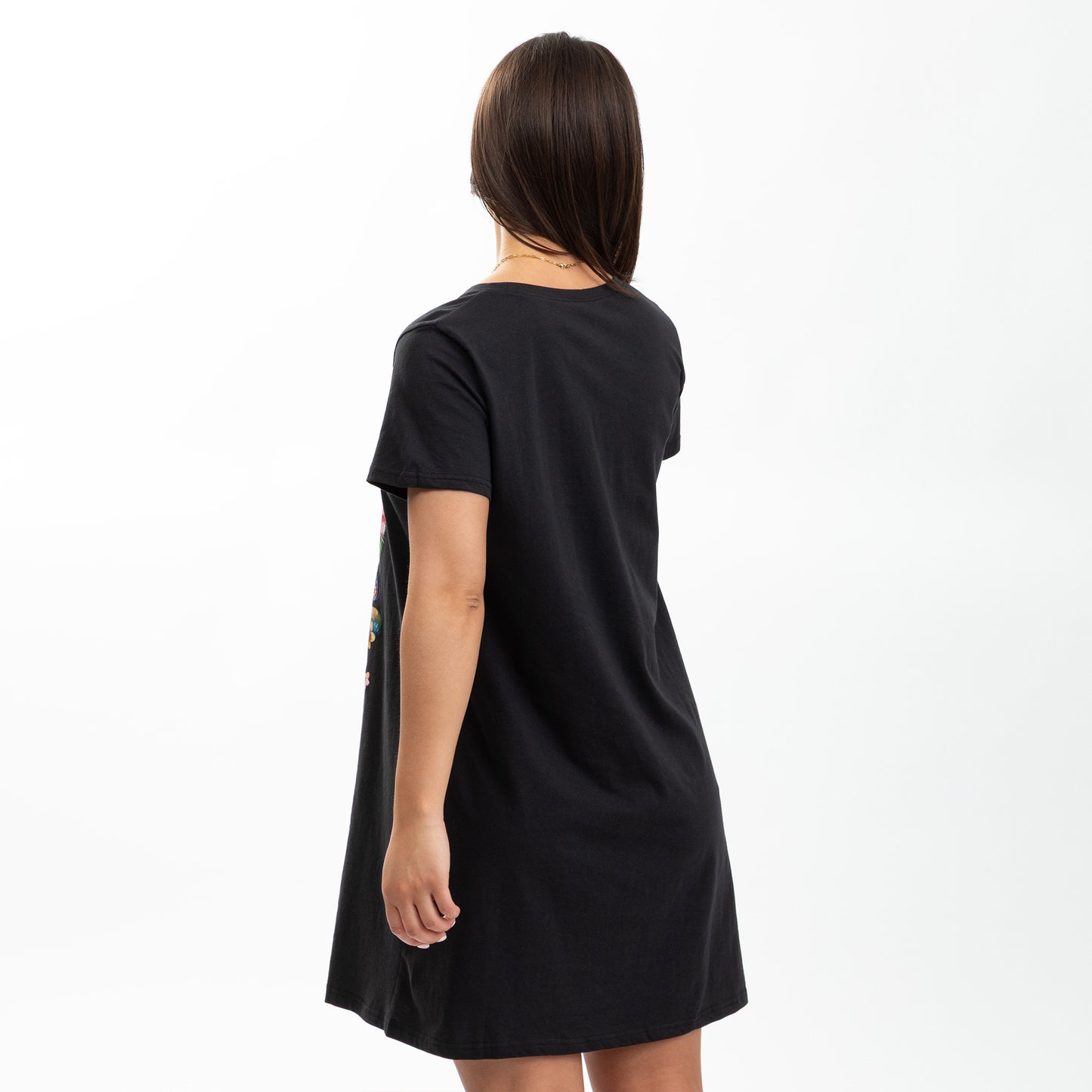 Black nightshirt worn by a person on a white background
