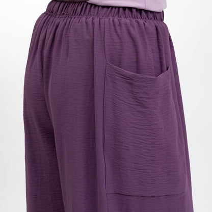 Purple pants with a pocket on a white background
