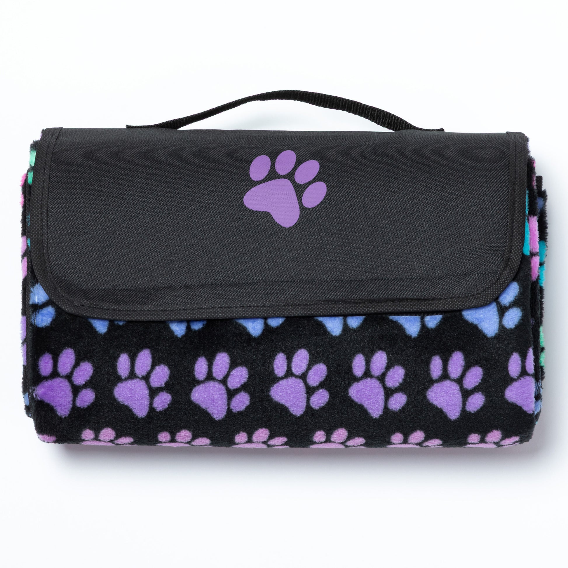 Black picnic blanket with purple paw prints and a handle on a white background.