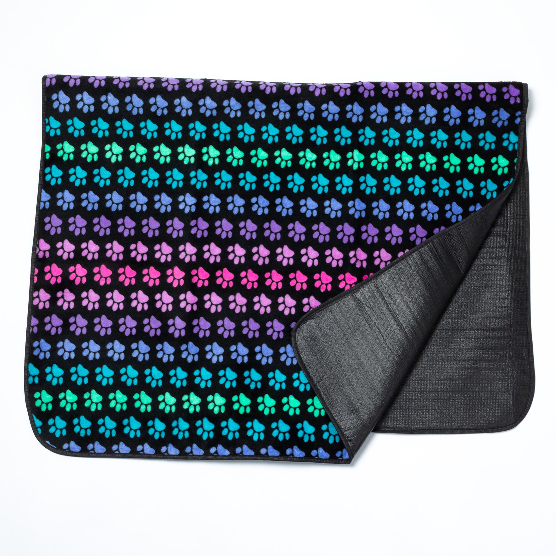 Pet blanket with colorful paw pattern on a white background.