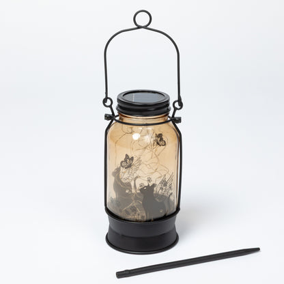 Decorative lantern with fairy design on a white background