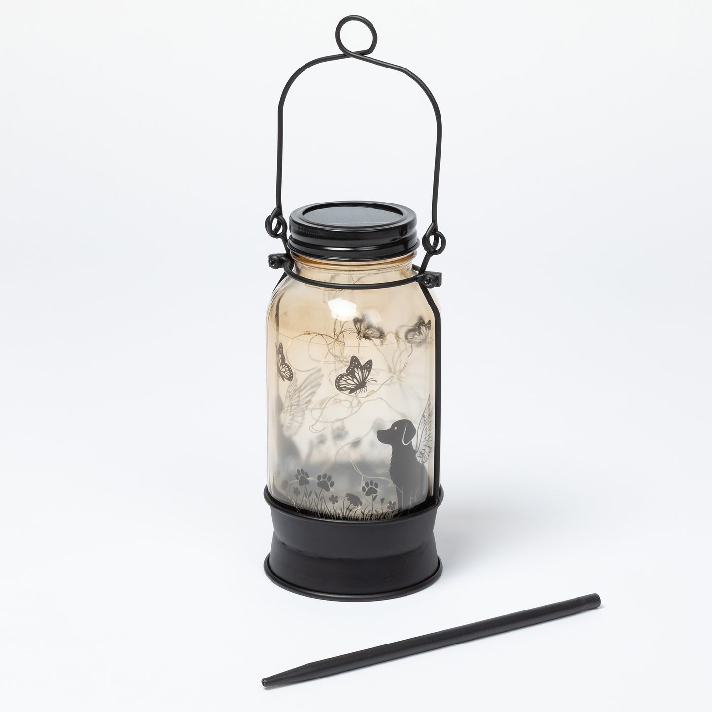 Solar lantern with decorative design on a white background