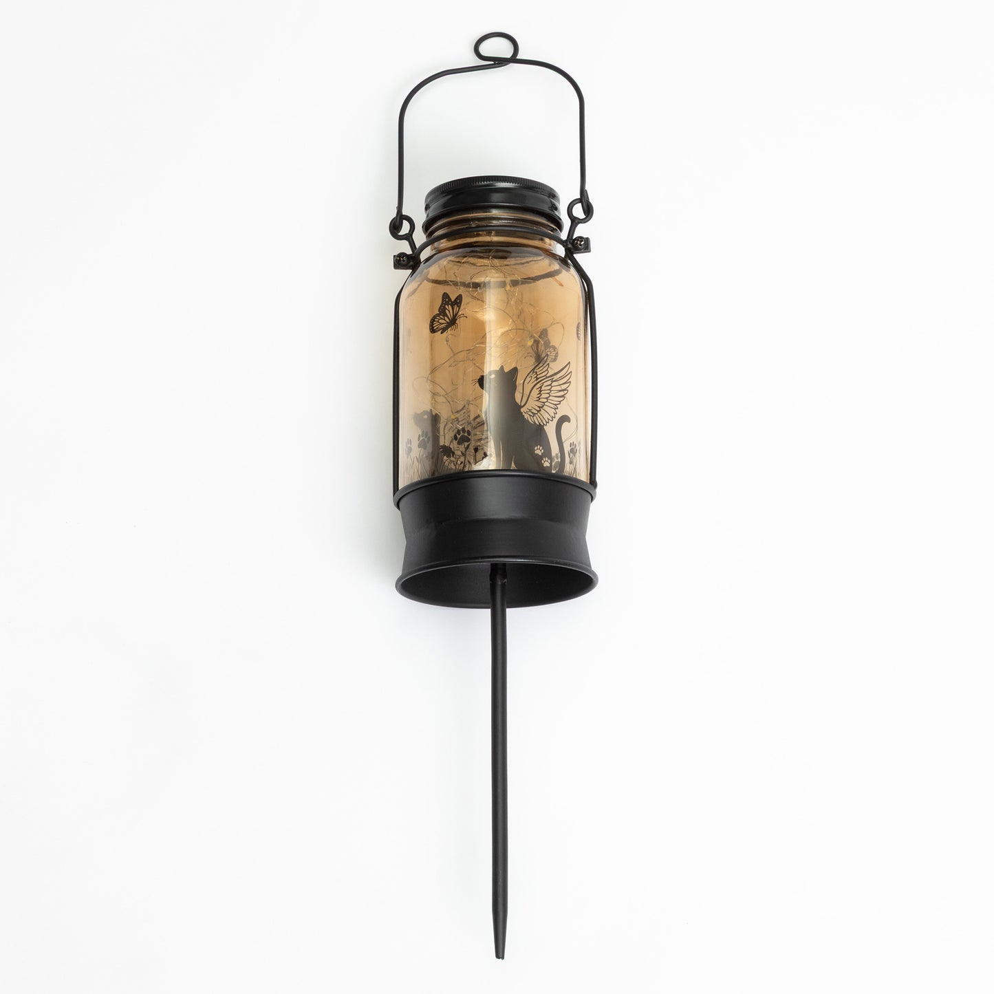 Decorative lantern with a black metal design on a white background