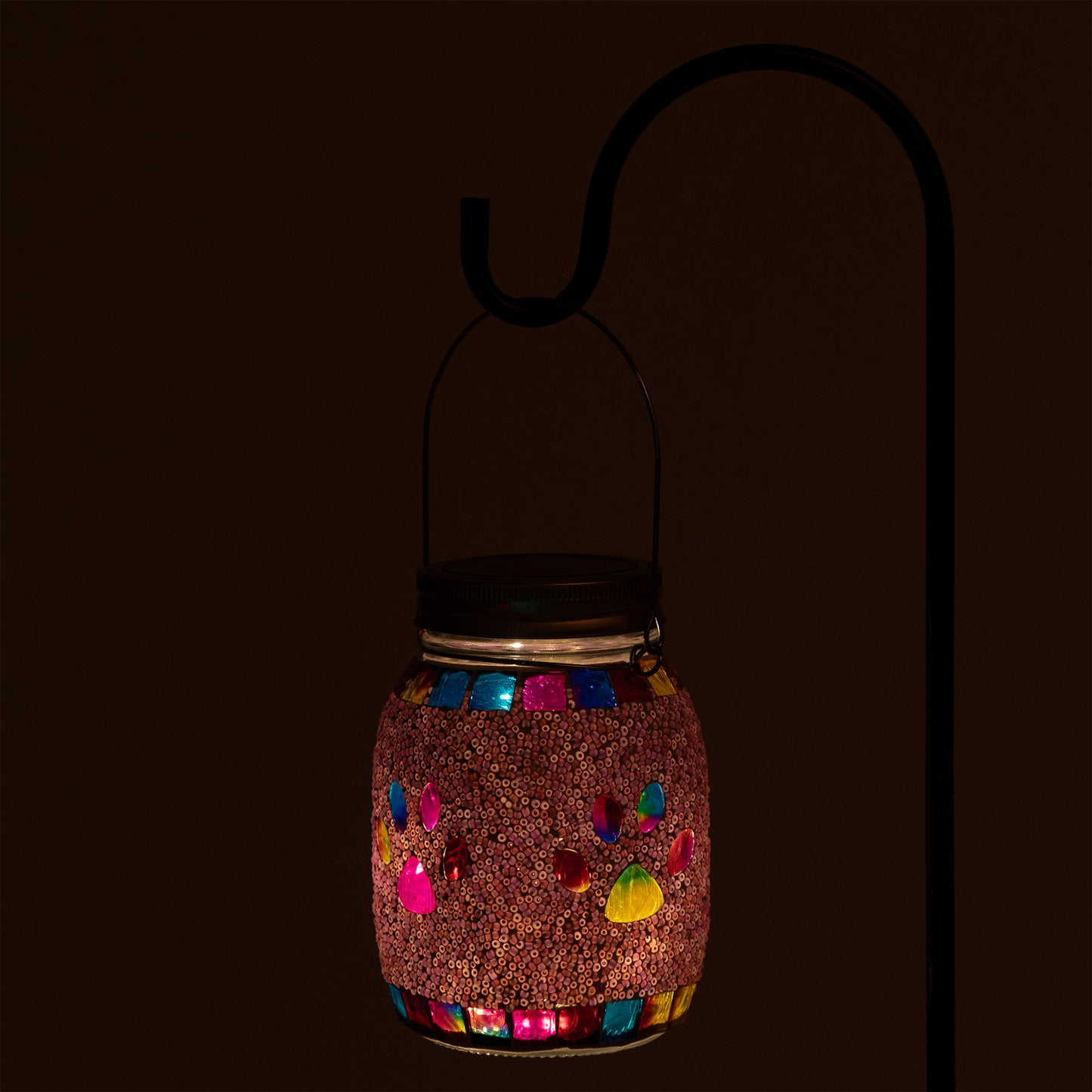 Decorative lantern with colorful lights on a dark background