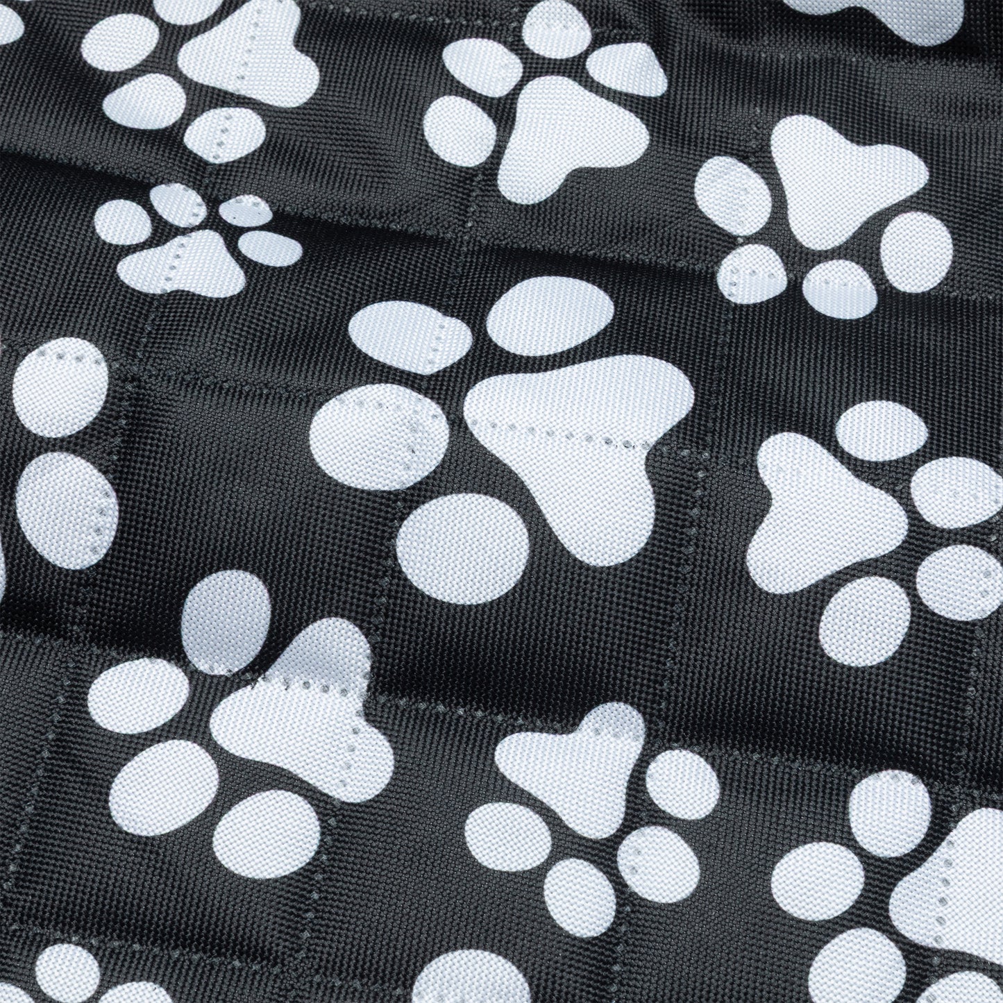 Black fabric quilted car seat cover with white paw print pattern