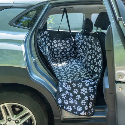 Car seat cover with paw pattern inside a vehicle