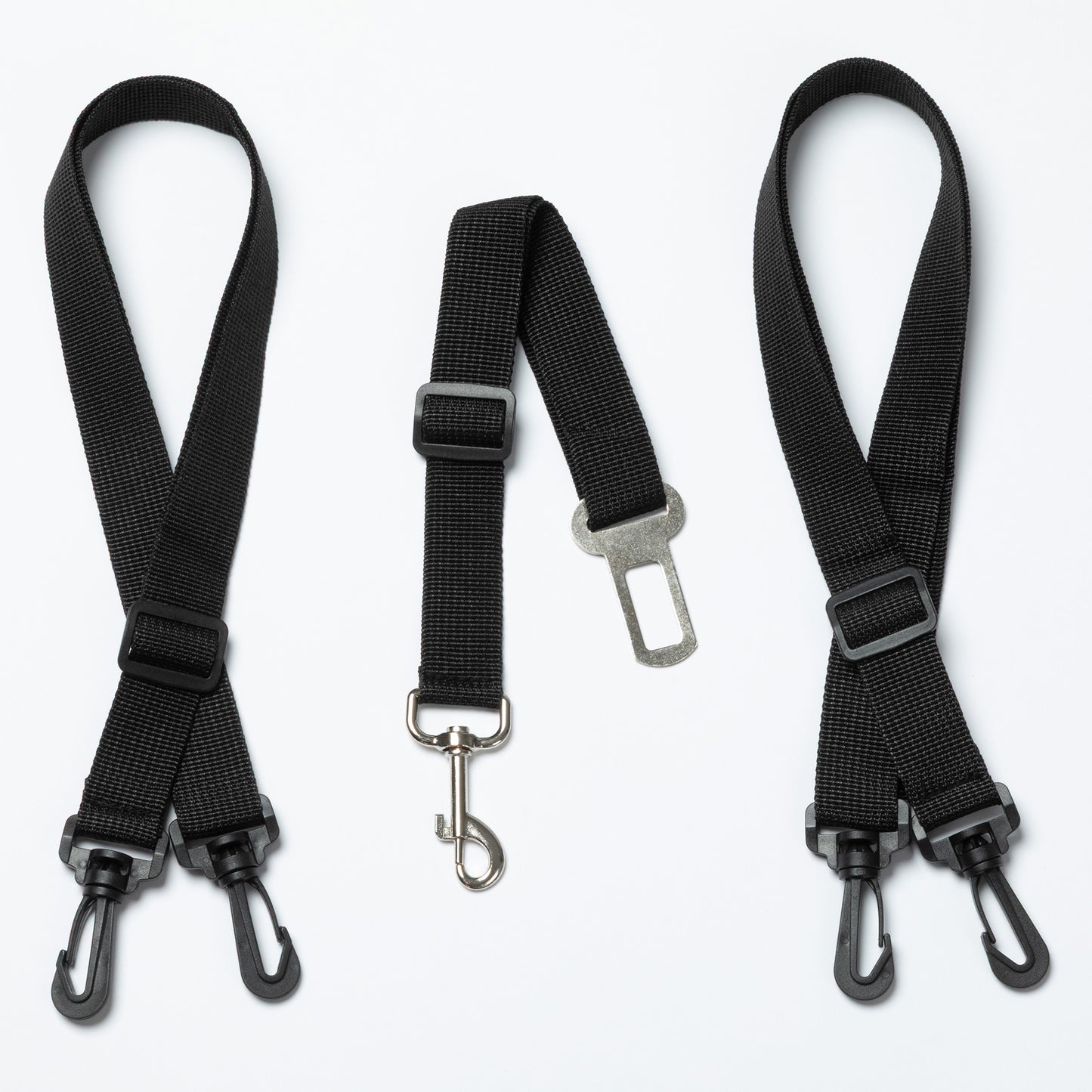 Three black seat belt straps with metal hooks on a white background