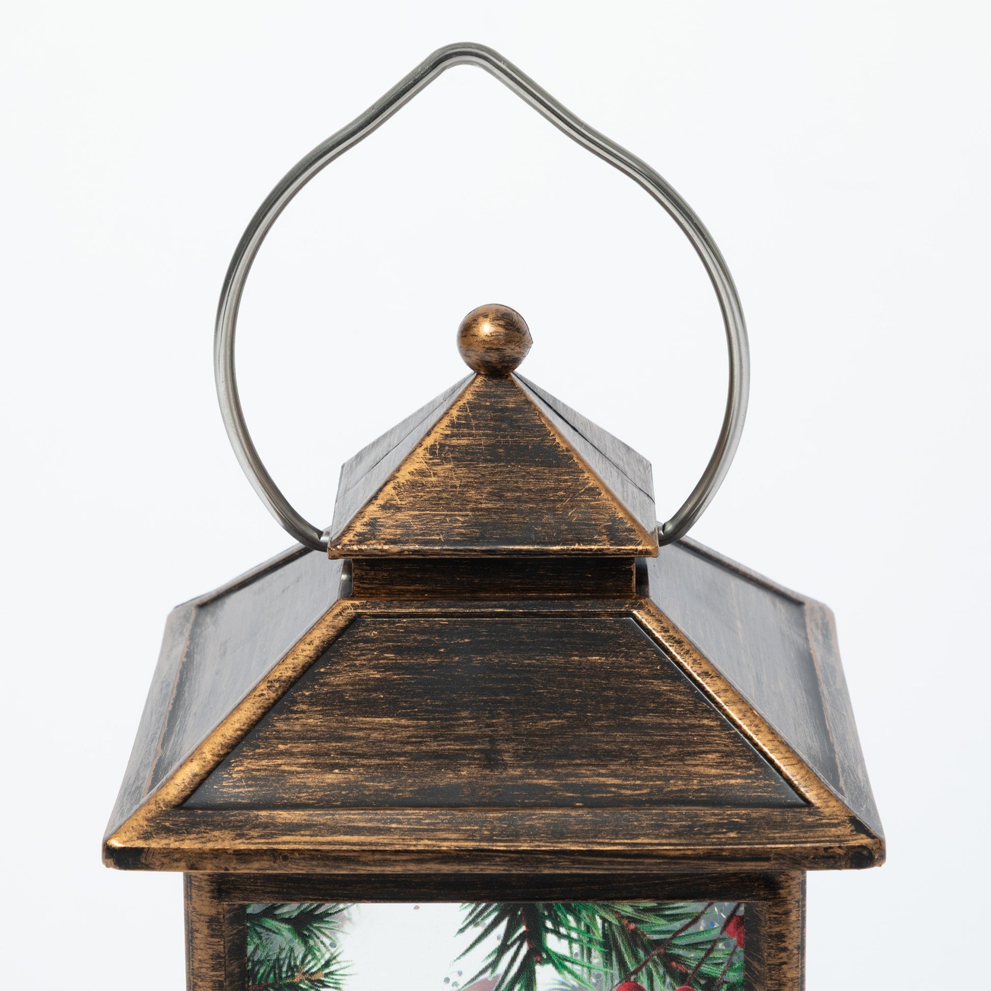 Decorative lantern with a rustic finish on a white background
