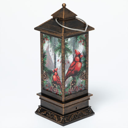 Decorative lantern with cardinals and nature design on a white background