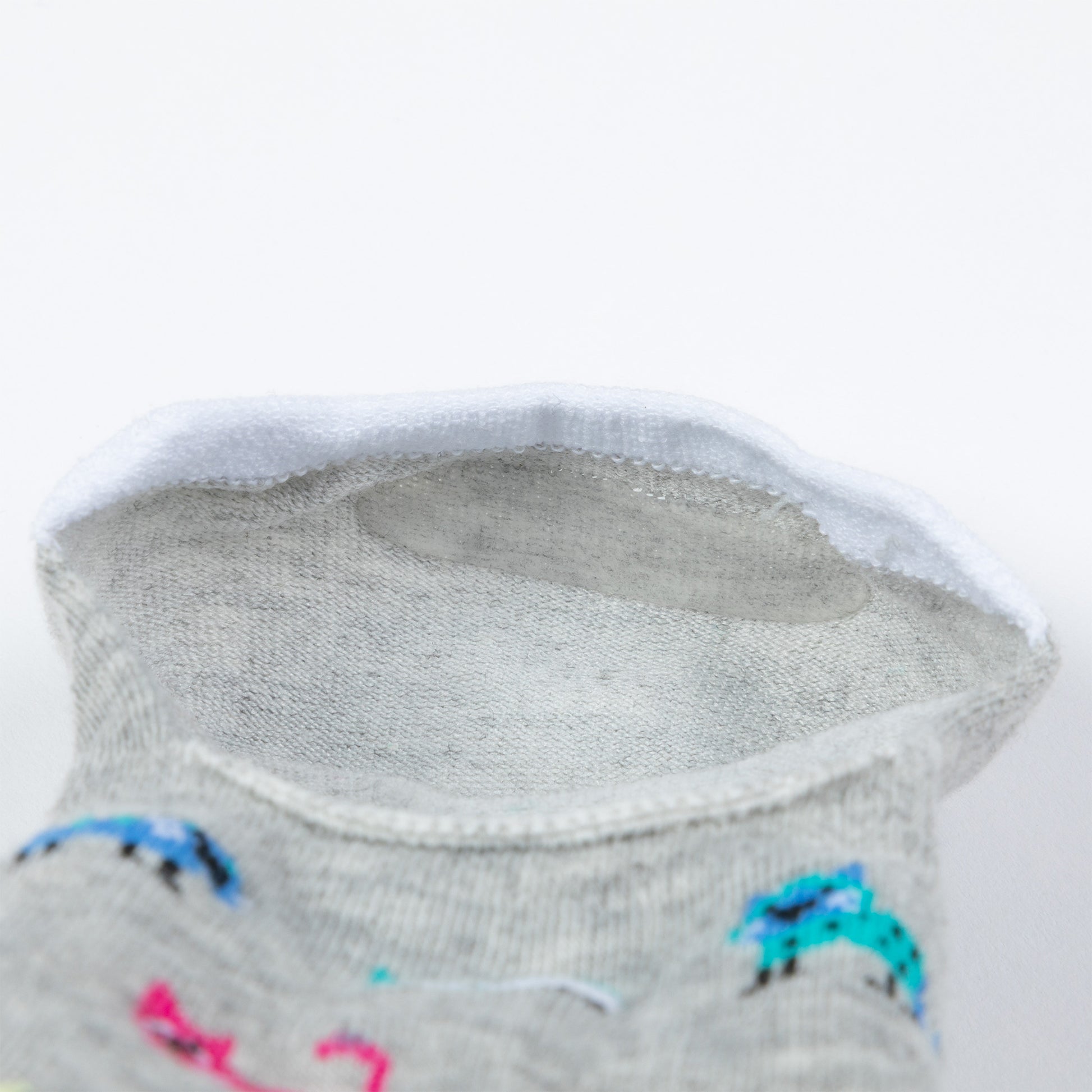 Gray sock with colorful designs on a white background