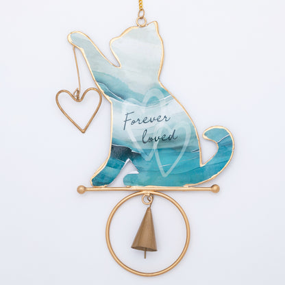 Decorative hanging chime with a cat silhouette, bell, and 'Forever Loved' text on a white background.