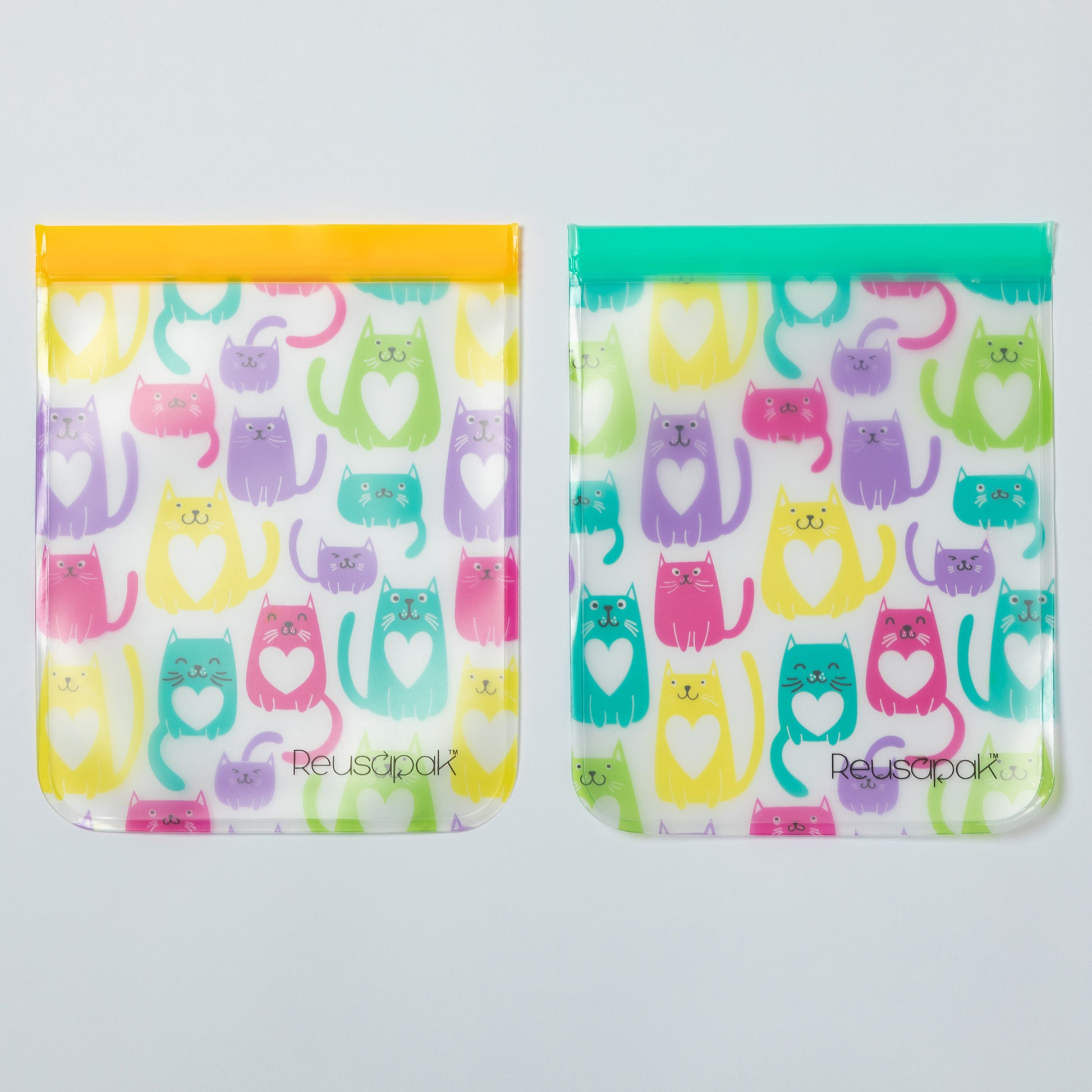 Two reusable snack bags with colorful cat pattern on a gray background