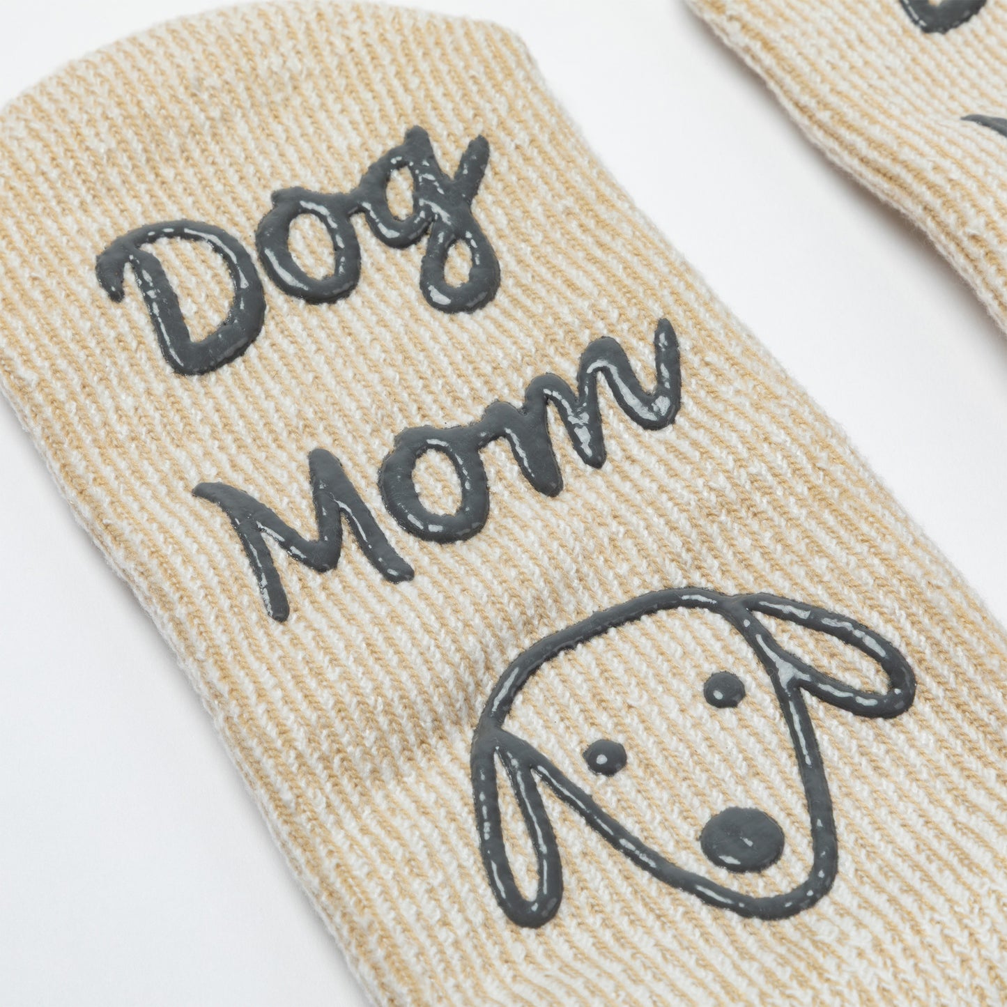 Beige sock with 'Dog Mom' text and dog illustration on a white background