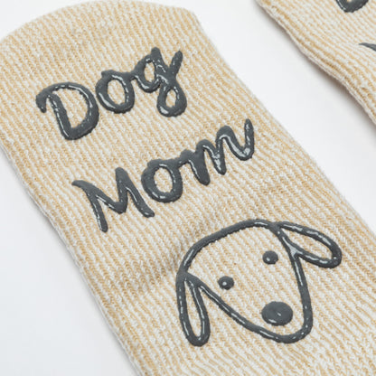Beige sock with 'Dog Mom' text and dog illustration on a white background