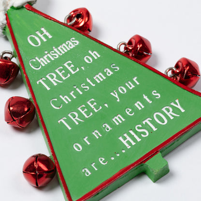 A green Christmas tree-shaped ornament with white text reading 'OH Christmas TREE, oh Christmas TREE, your ornaments are HISTORY"