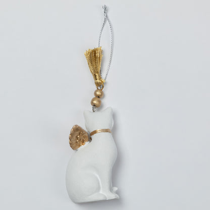 A white cat-shaped ornament with gold accents, including a collar, ear detail, and tassel, hanging from a silver chain against a light gray background.