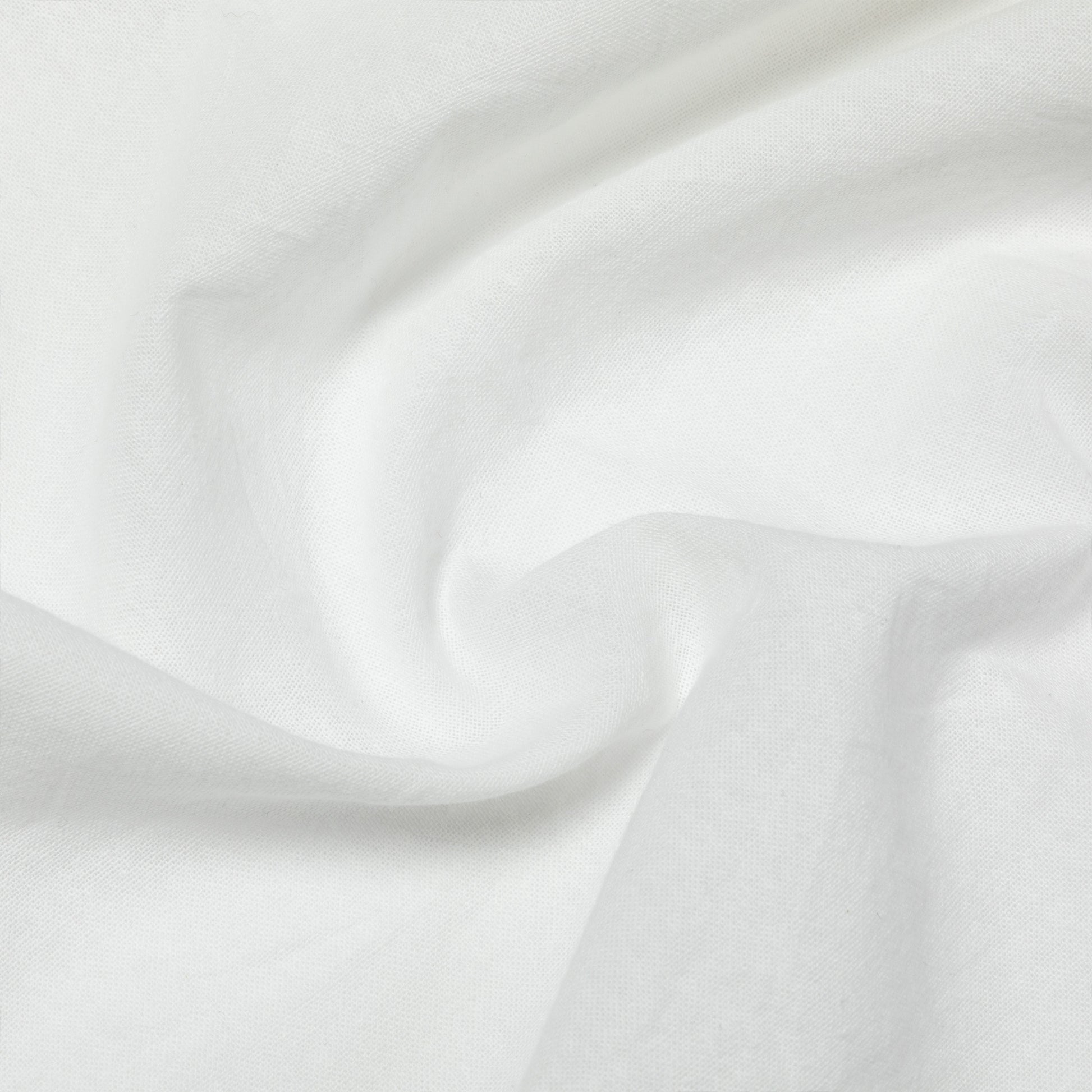 Close-up of white dish towel with subtle texture