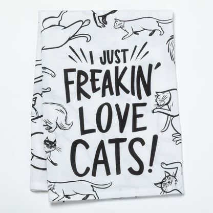 Tea towel with black text 'I Just Freakin' Love Cats!' and black cat illustrations on a white background