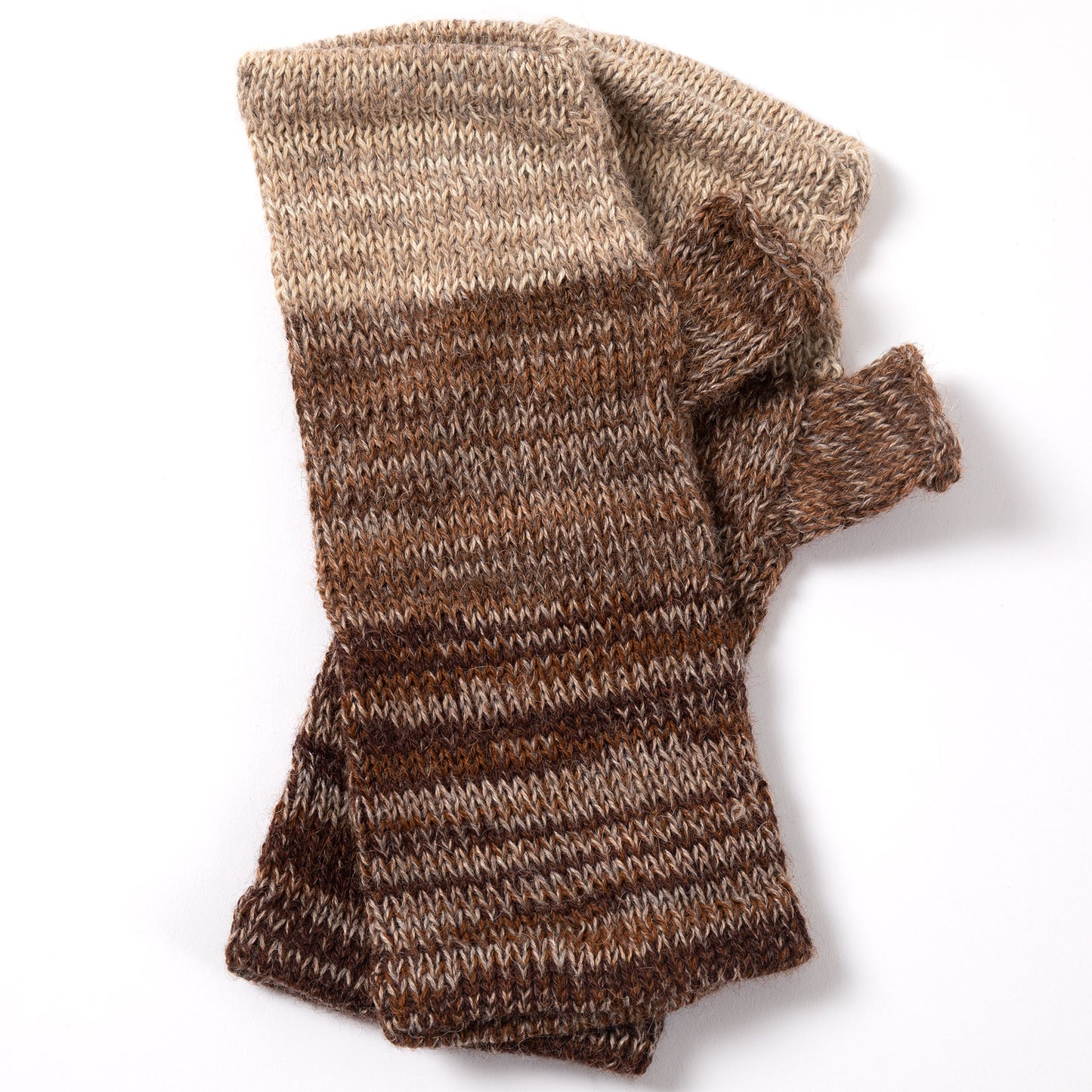 a pair of alpaca fingerless mittens in shades of brown made from alpaca wool on a white background