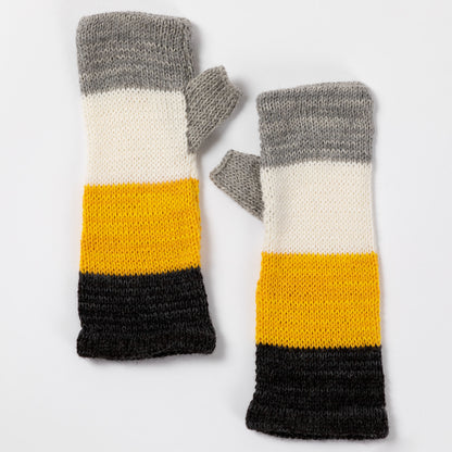 a pair of alpaca fingerless mittens in gray, white, yellow, and black made from alpaca wool on a white background