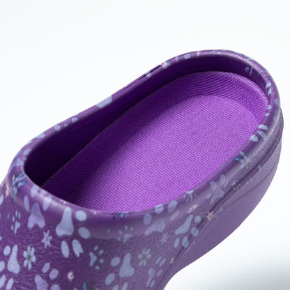 Purple clog heel with floral pattern on a white background