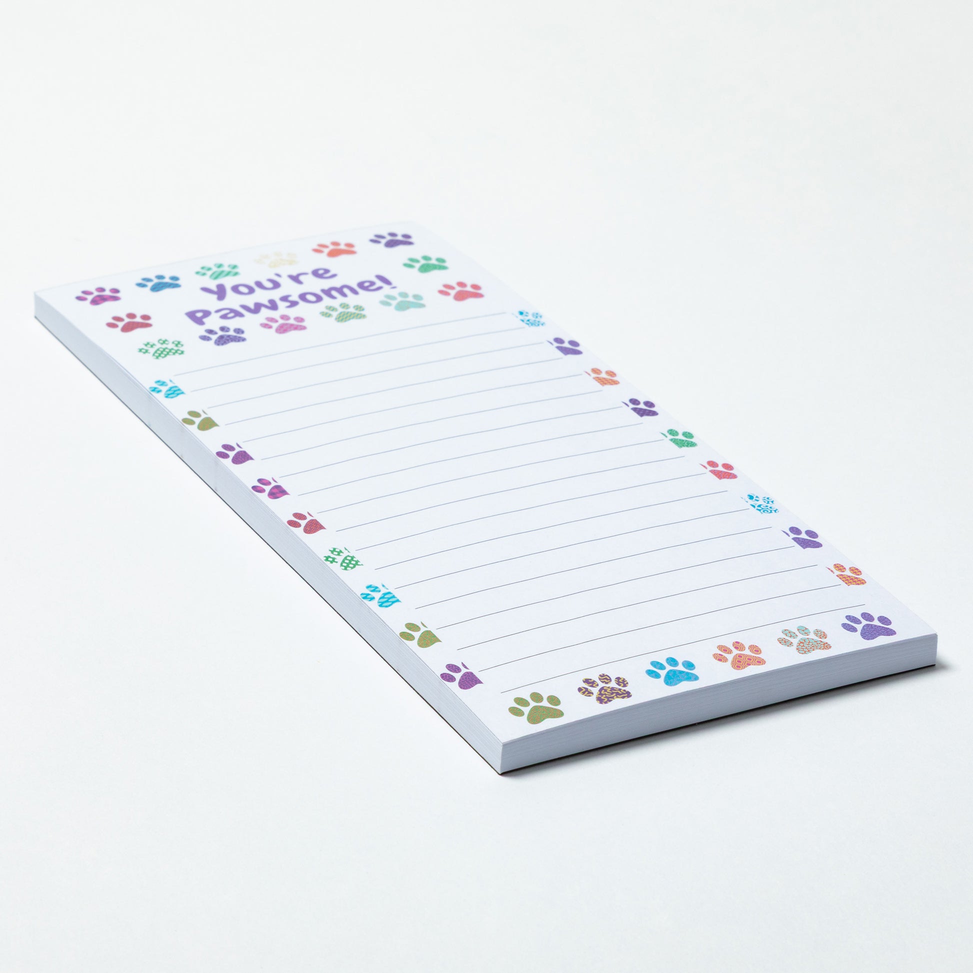 Notepad with colorful paw prints and text on a white background