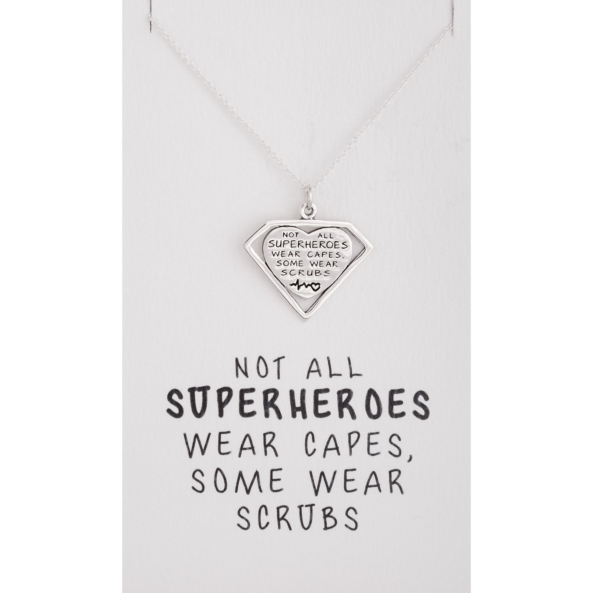 Necklace with a heart-shaped pendant on a white card with text.