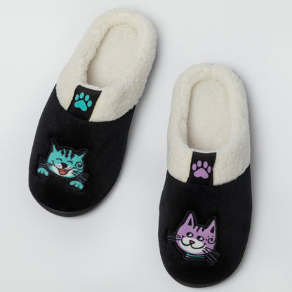 Black and White Sherpa slippers with blue and purple cats on top