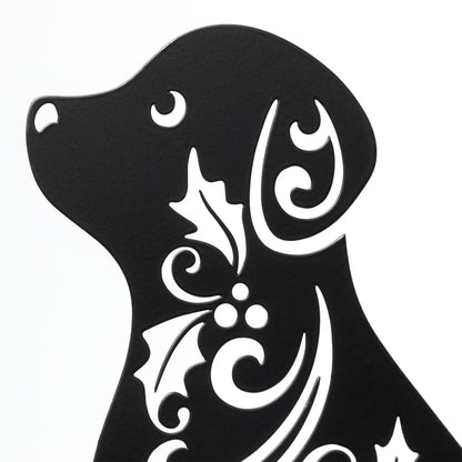 Black silhouette of a dog with white decorative patterns on a white background