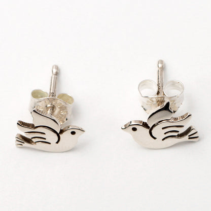 Silver bird-shaped earrings on a white background